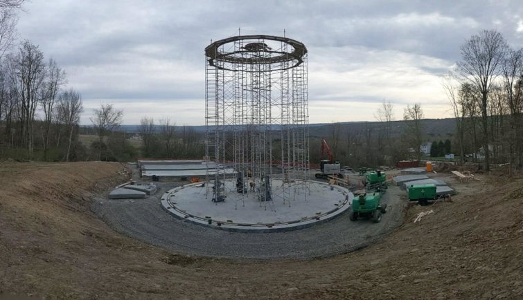 metal frame of water tank on cement base